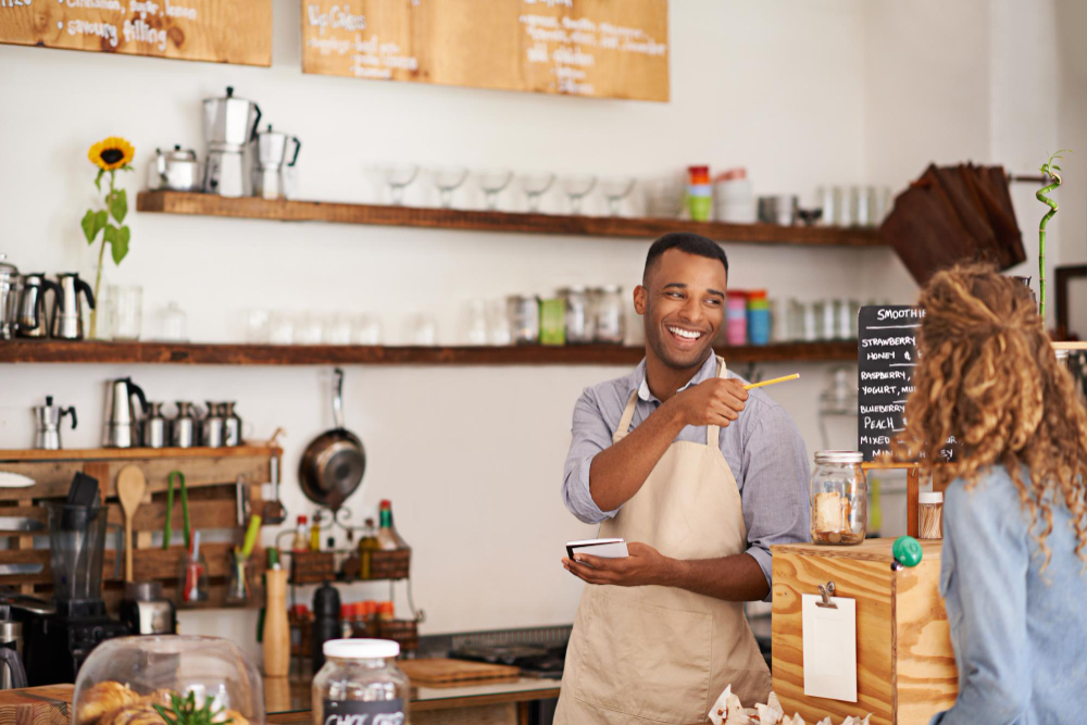 A Baraza barista taking an order.